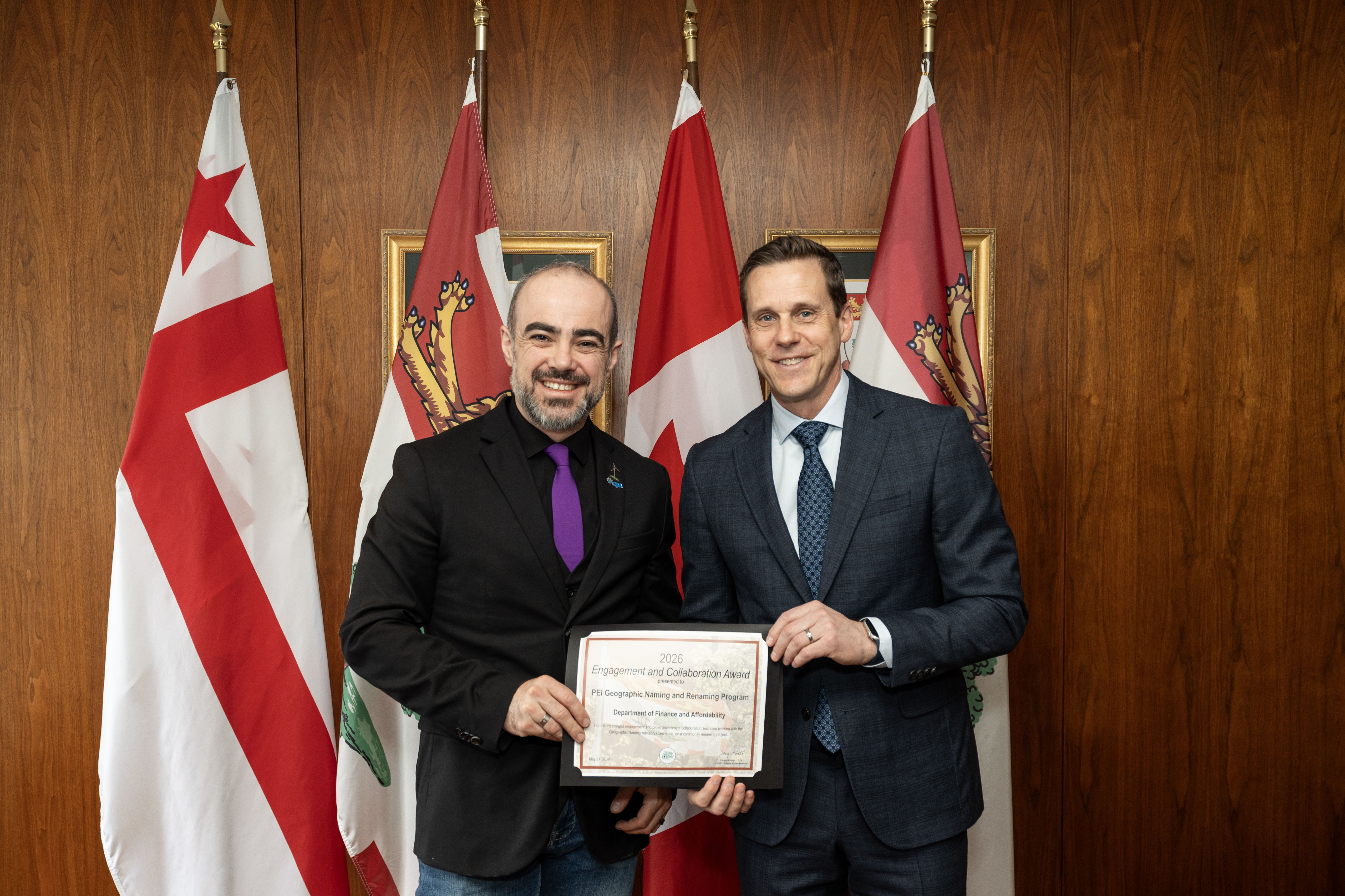 "Premier Lantz presenting award to recipient Ryan Pineau"